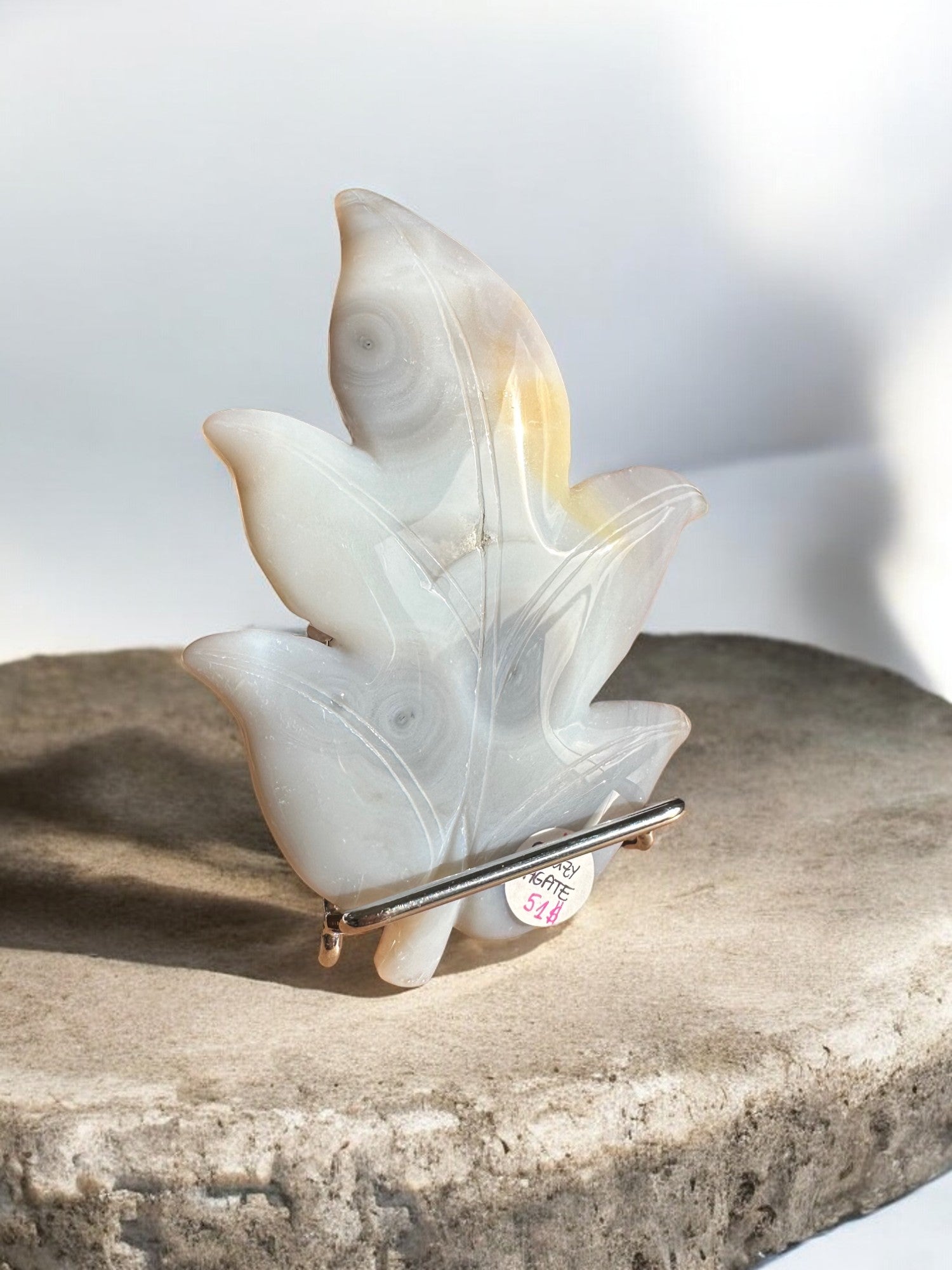 Agate crystal longer leaf on a stand