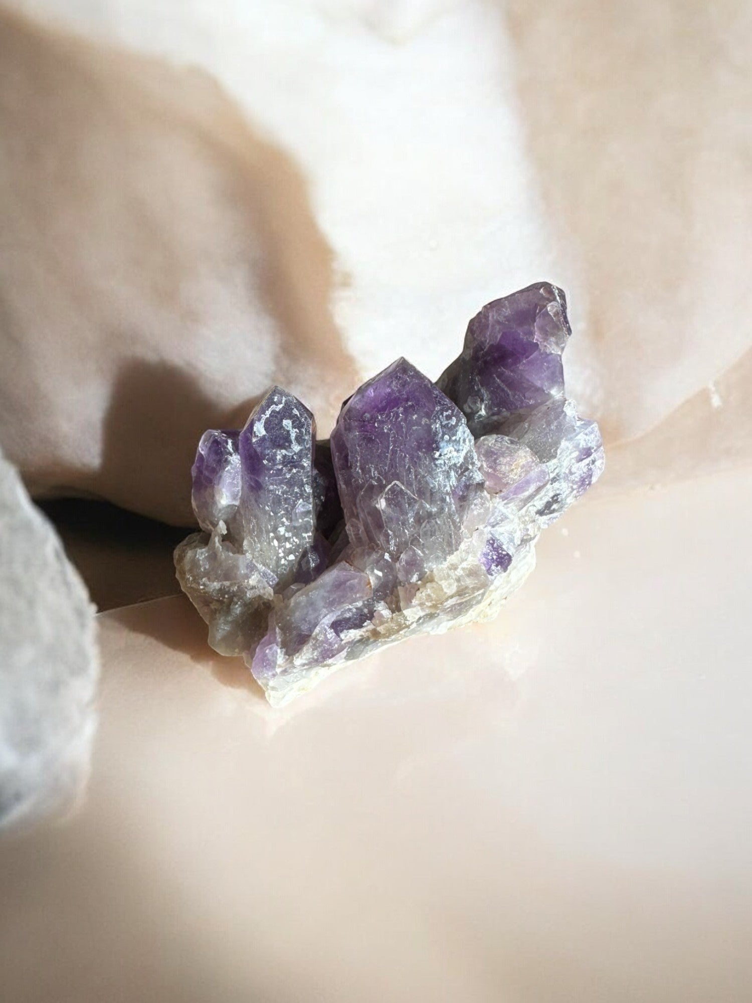 Amethyst raw crystal cluster side view