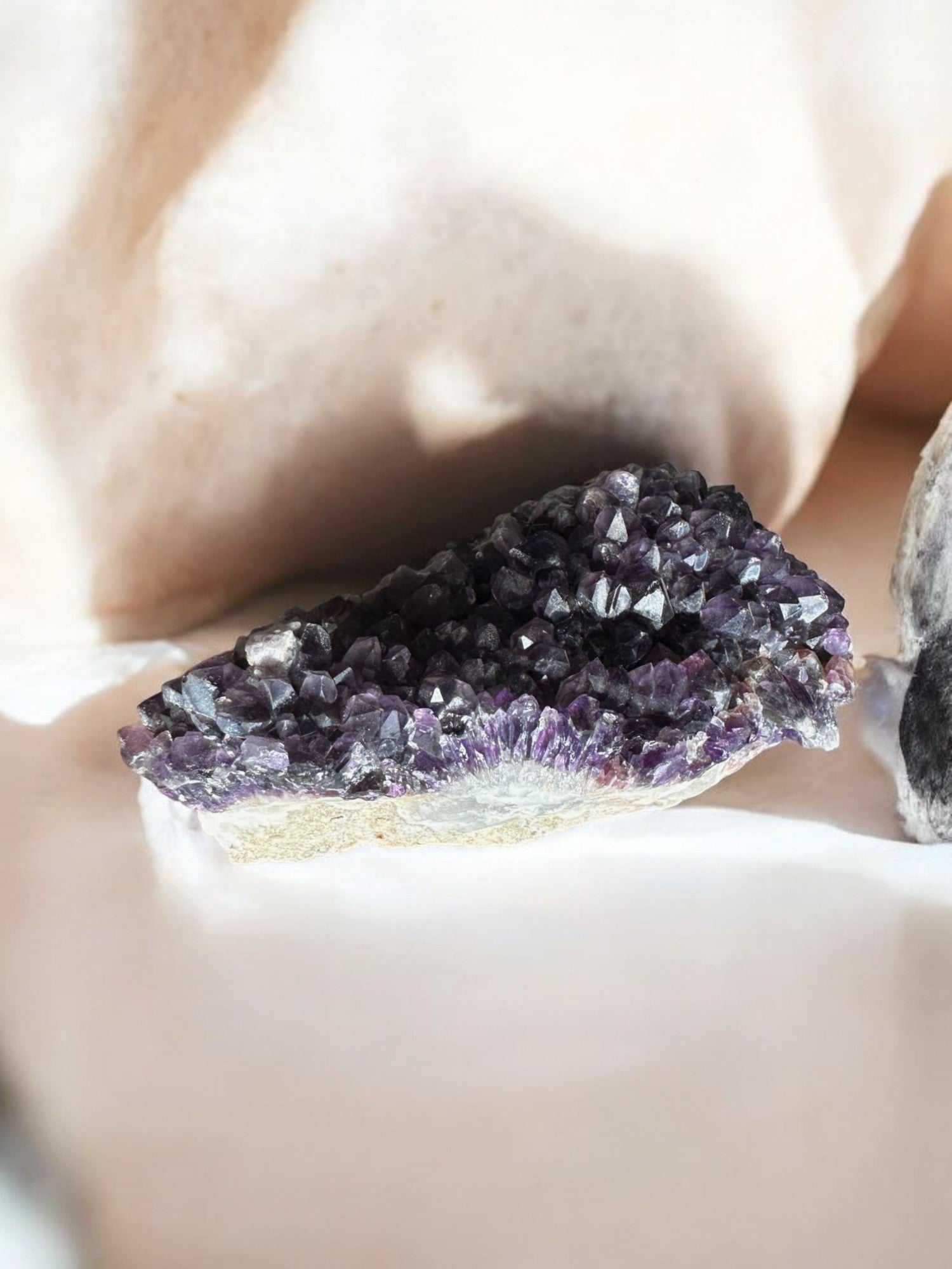 Amethyst raw crystal with small points