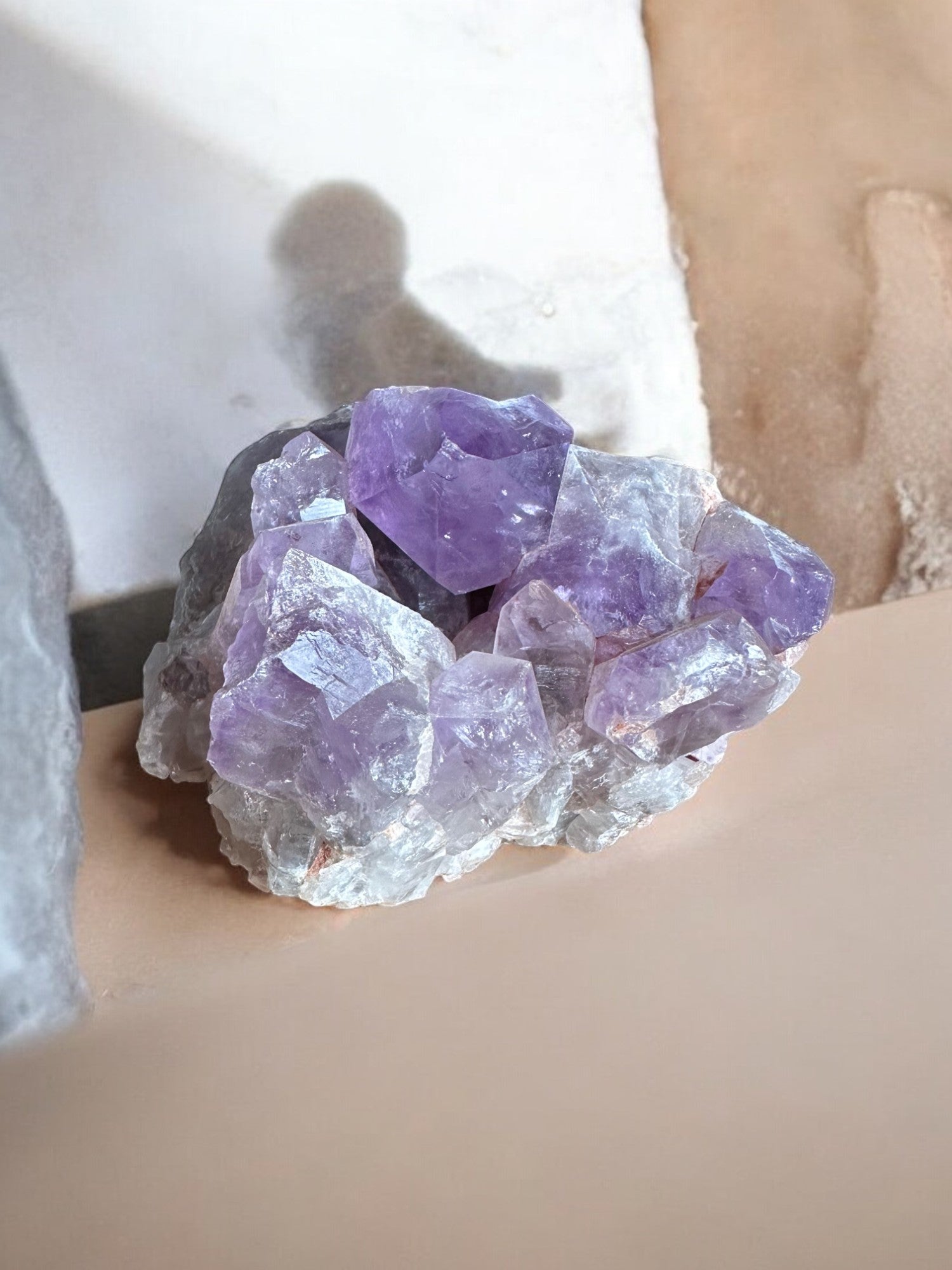 Big amethyst crystal cluster on the table