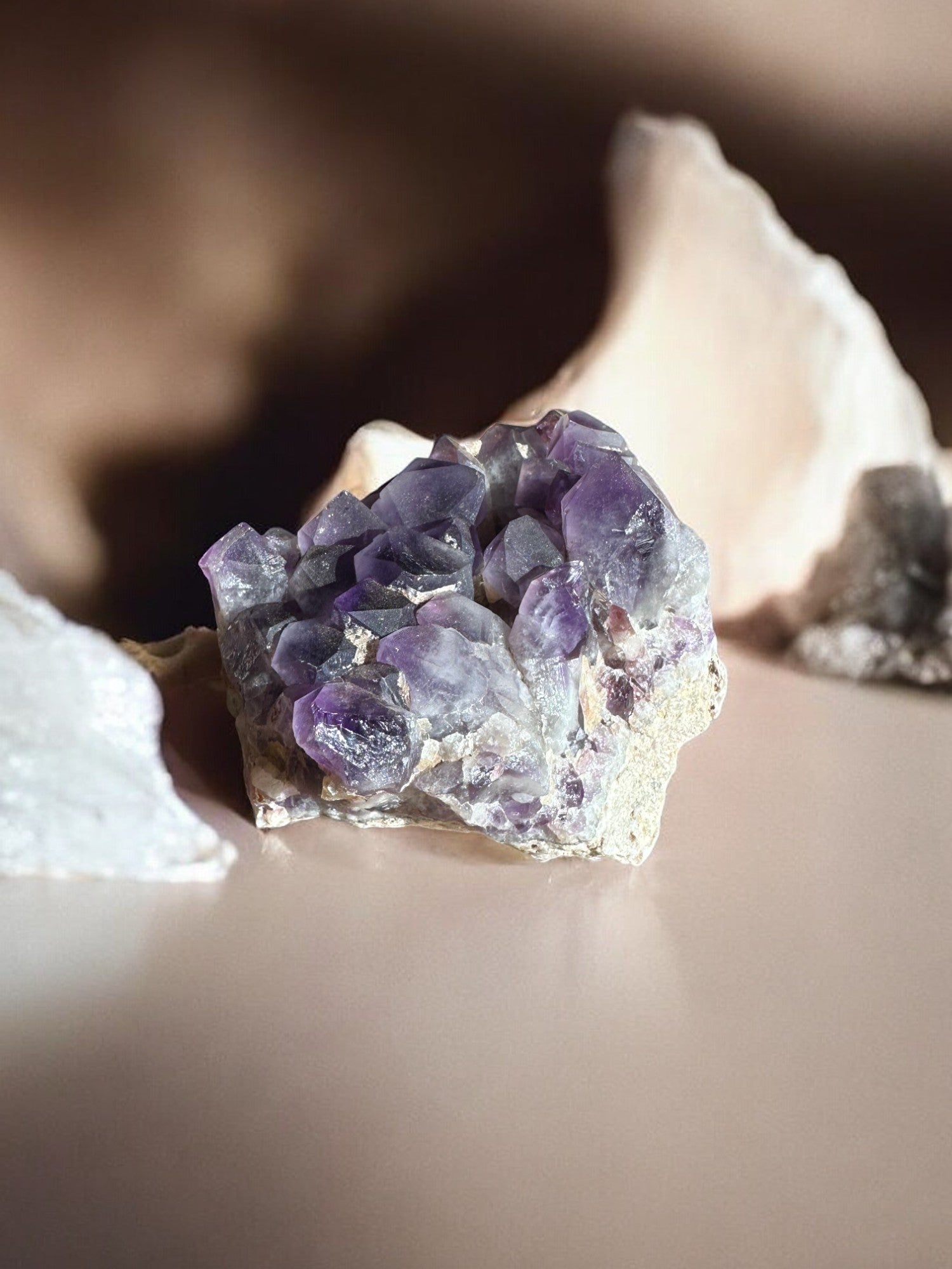 Big raw crystal cluster of amethyst