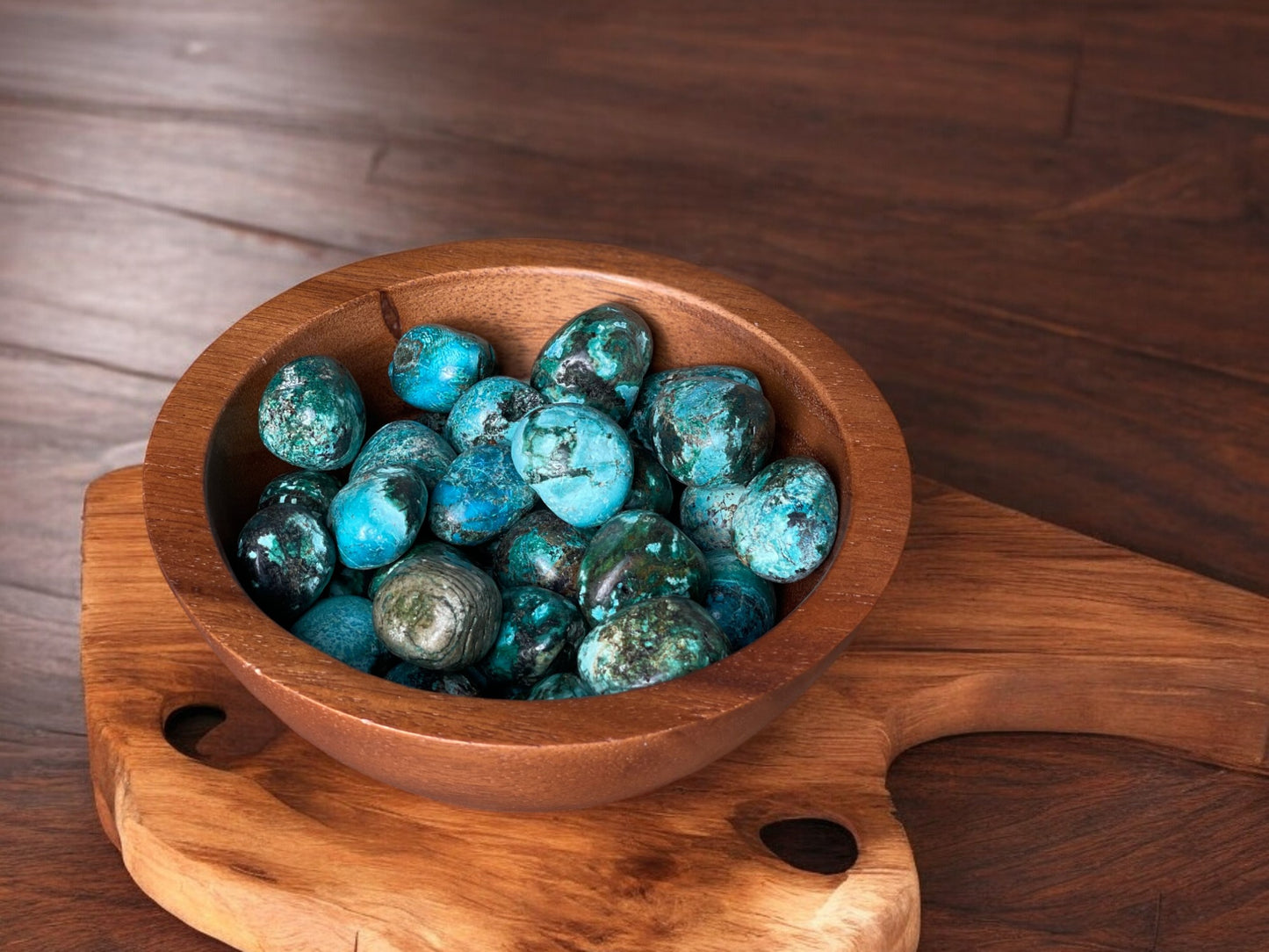 Chrysocolla tumbled crystals in a bowl