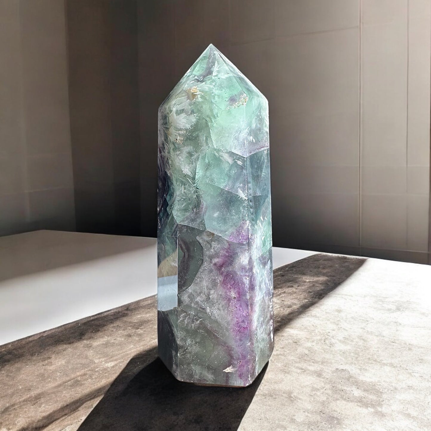 Feather fluorite crystal tower with inclusions