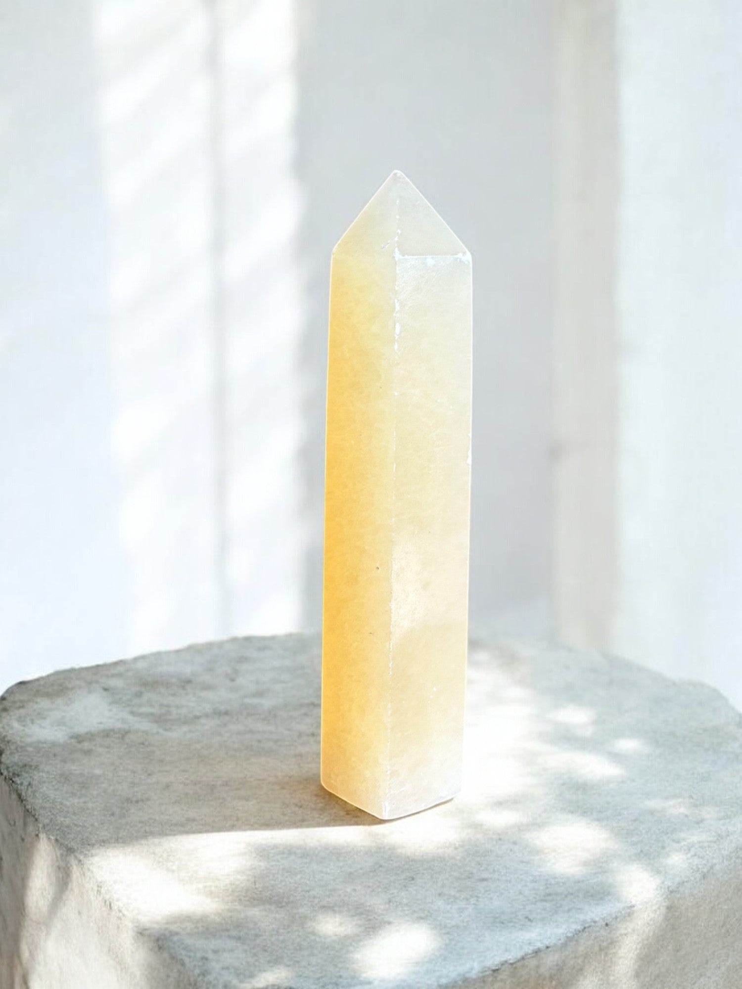 Orange calcite crystal tower 2 front side