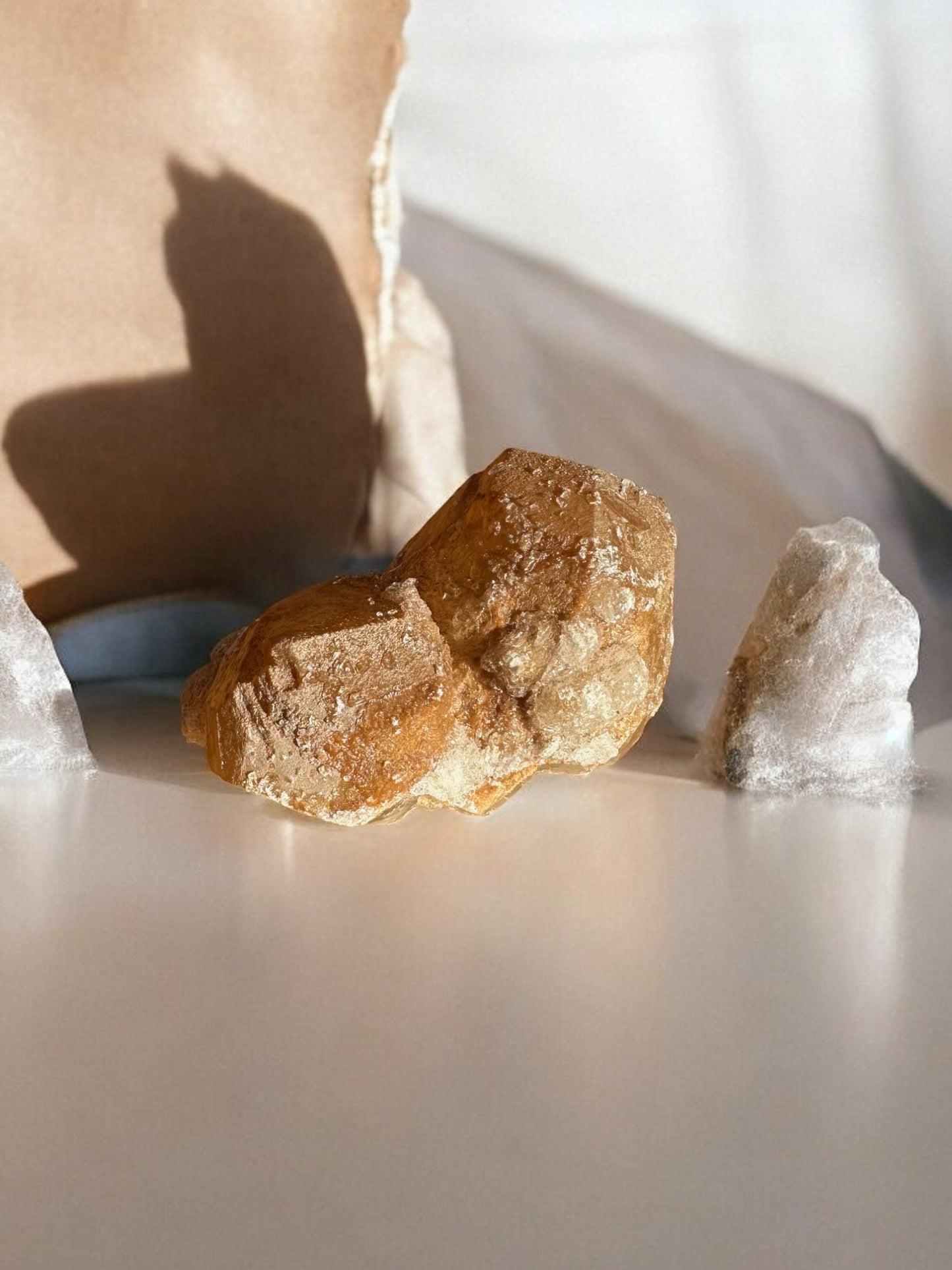 Orange calcite raw crystal side view