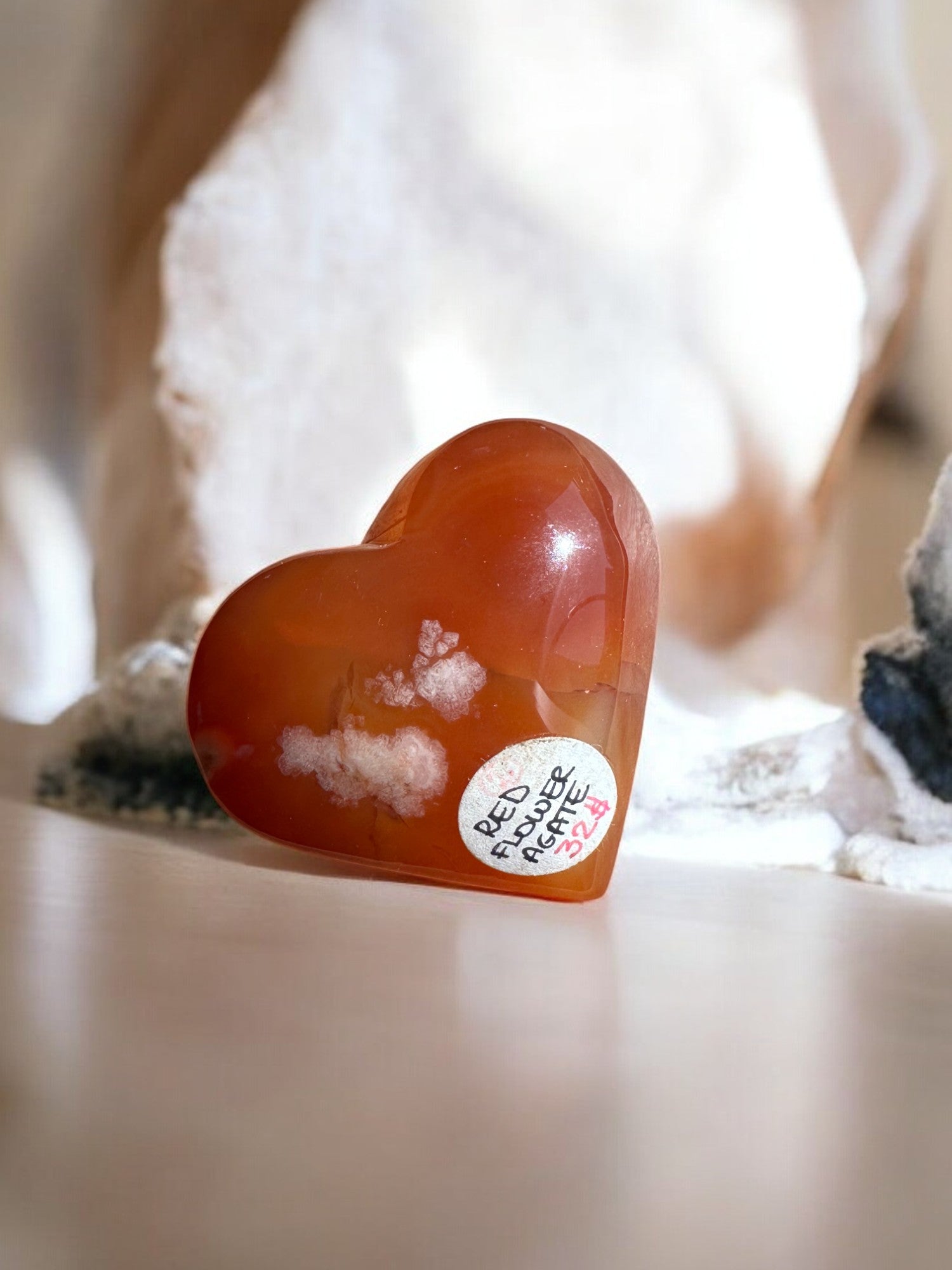 Red flower agate heart crystal shape