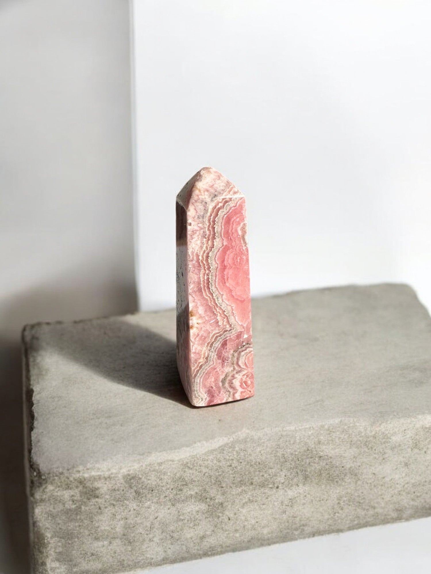 Rhodochrosite crystal tower on a slab