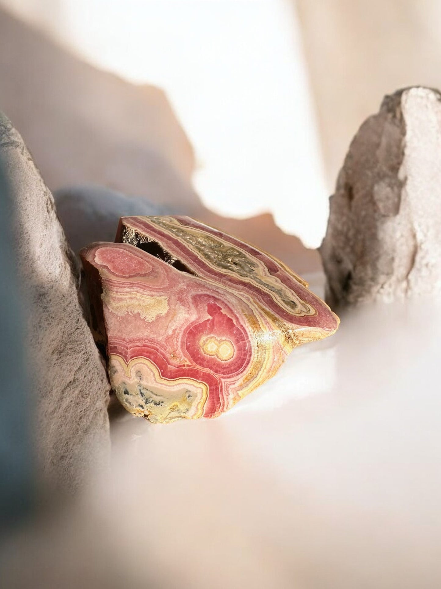 Rhodochrosite raw crystal back view