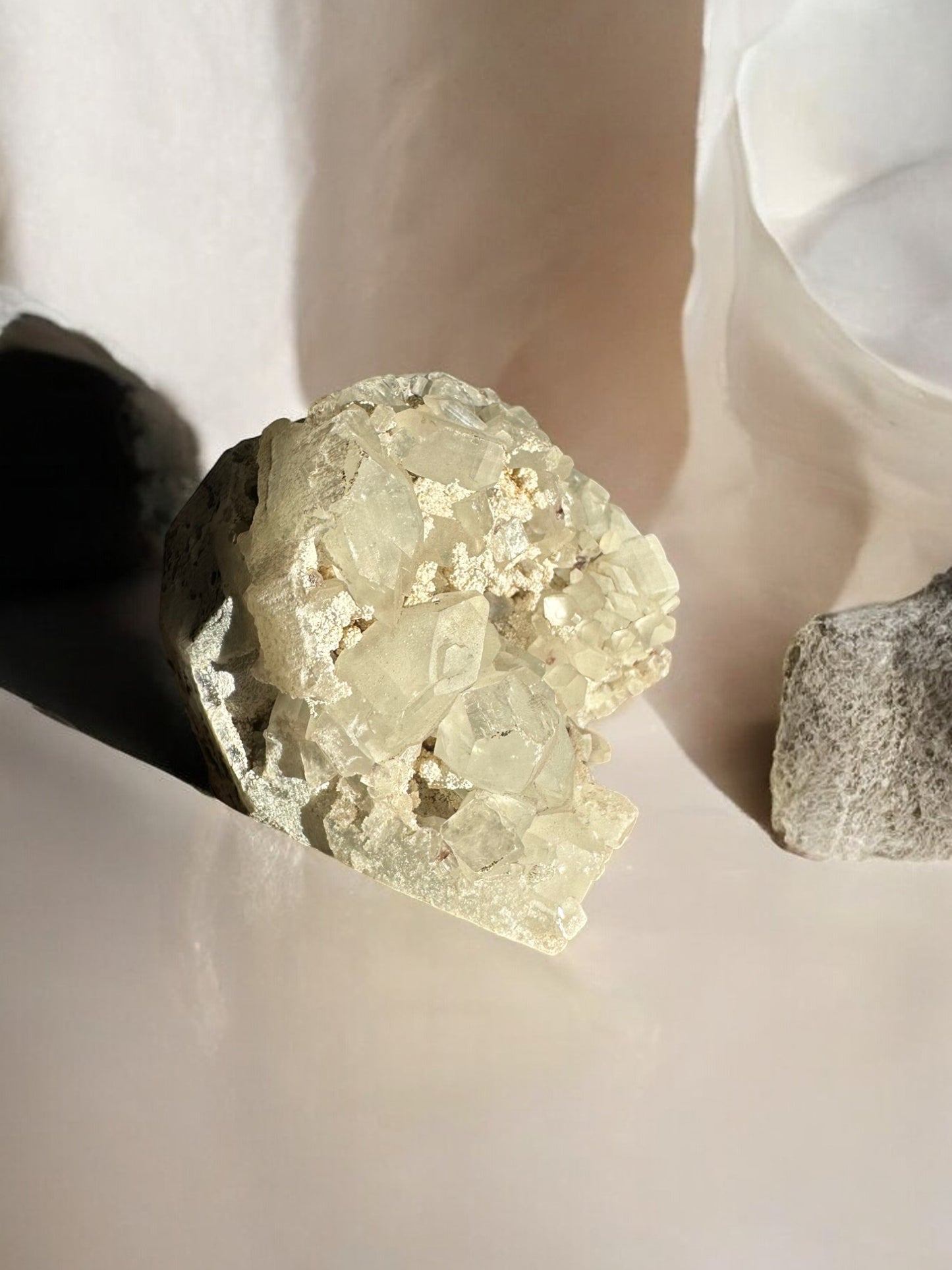 Raw apophyllite crystal cluster sideview