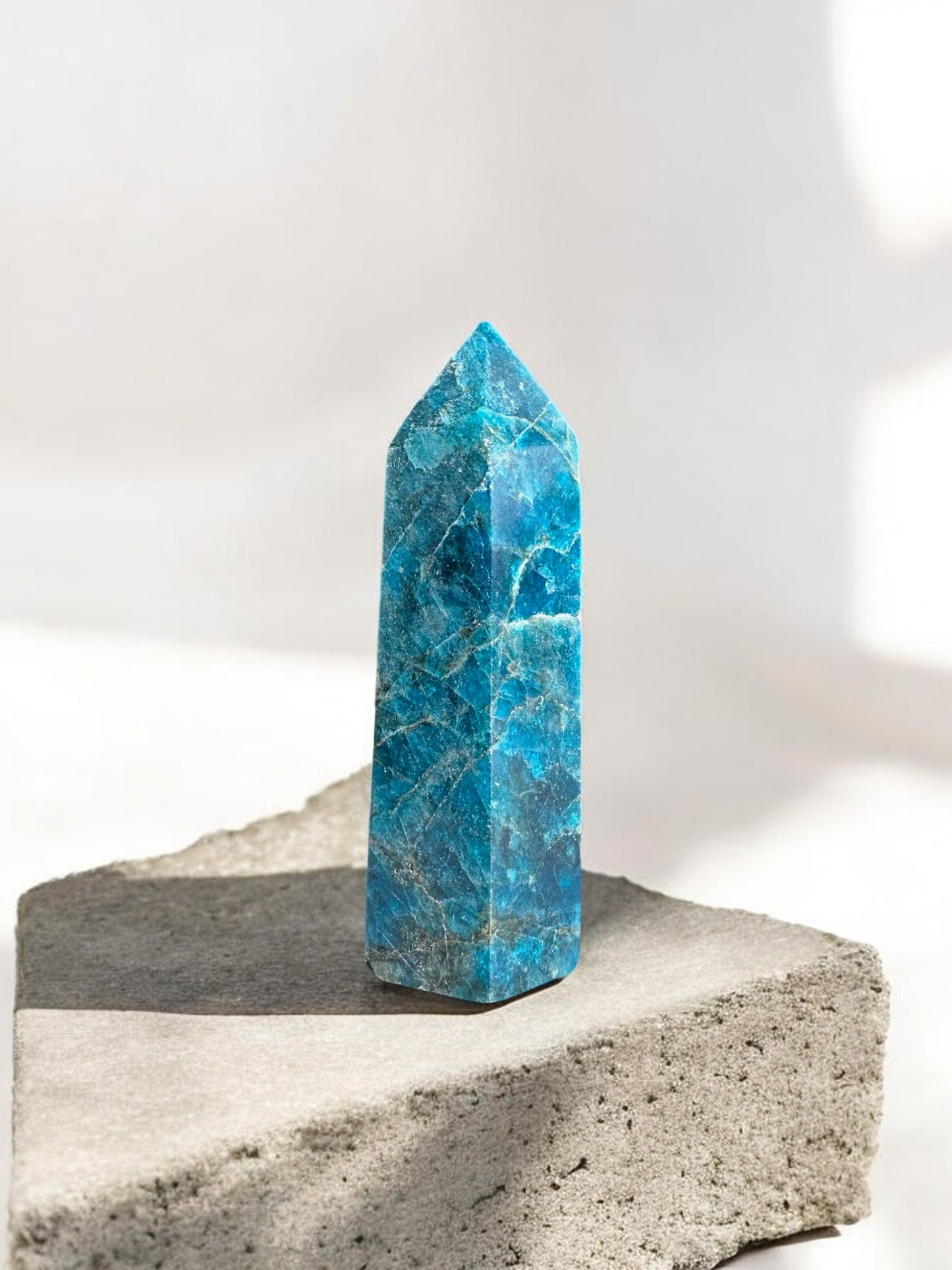 Blue apatite crystal tower on a slab