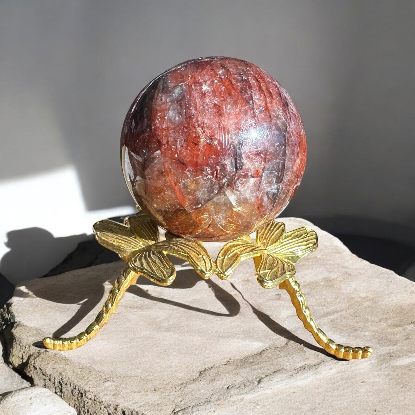 fire quartz sphere dark red front view