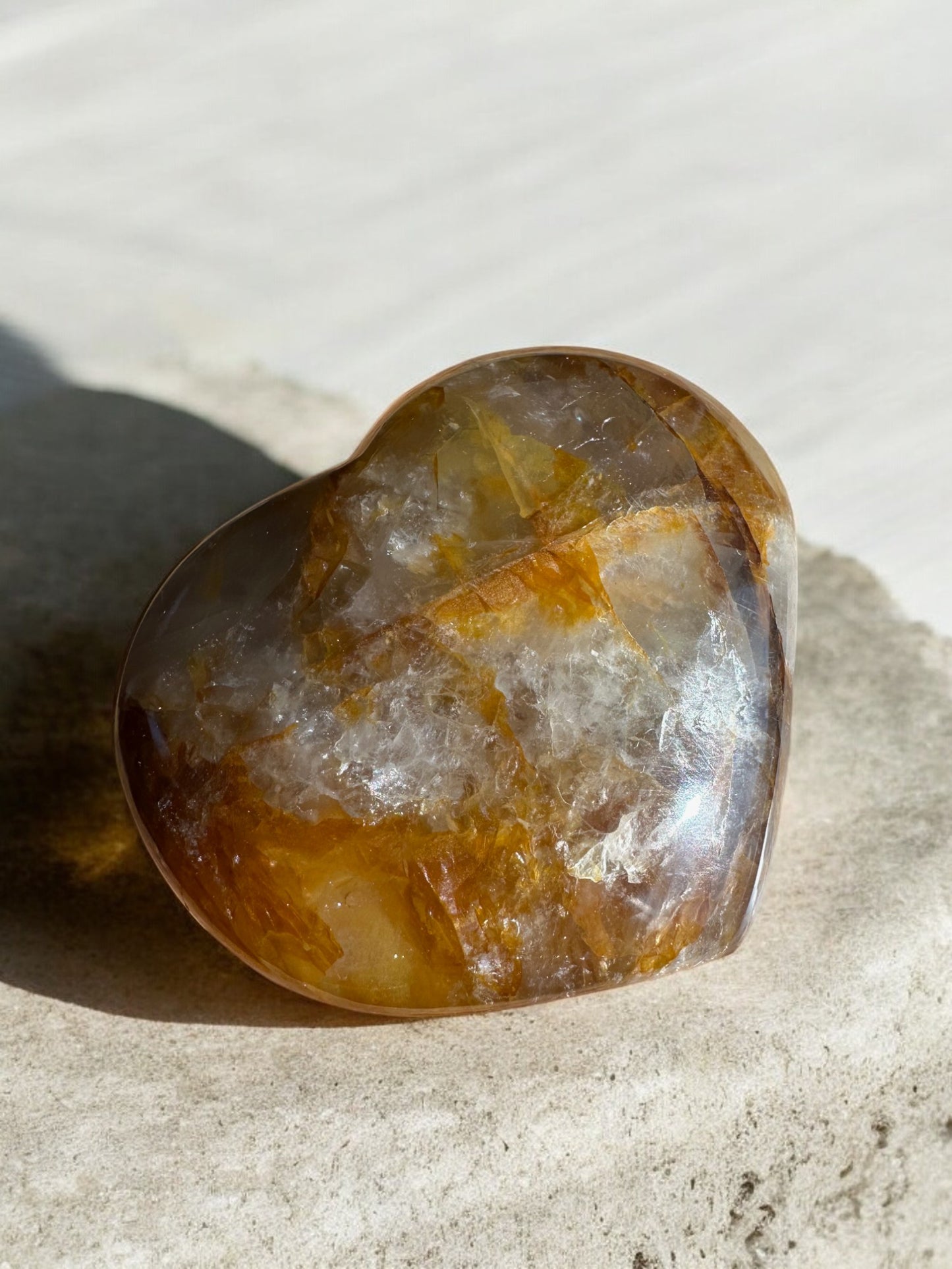 Golden healer quartz crystal heart with inclusion