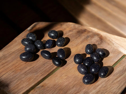 Blue goldstone tumbled crystals