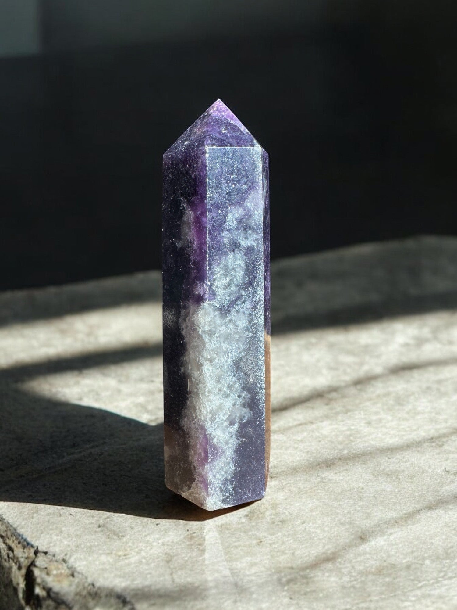 Lepidolite crystal tower with calcite inclusions