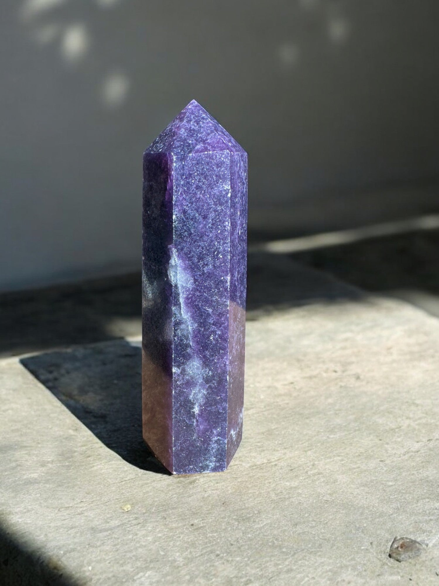 Lepidolite crystal tower front view dark purple