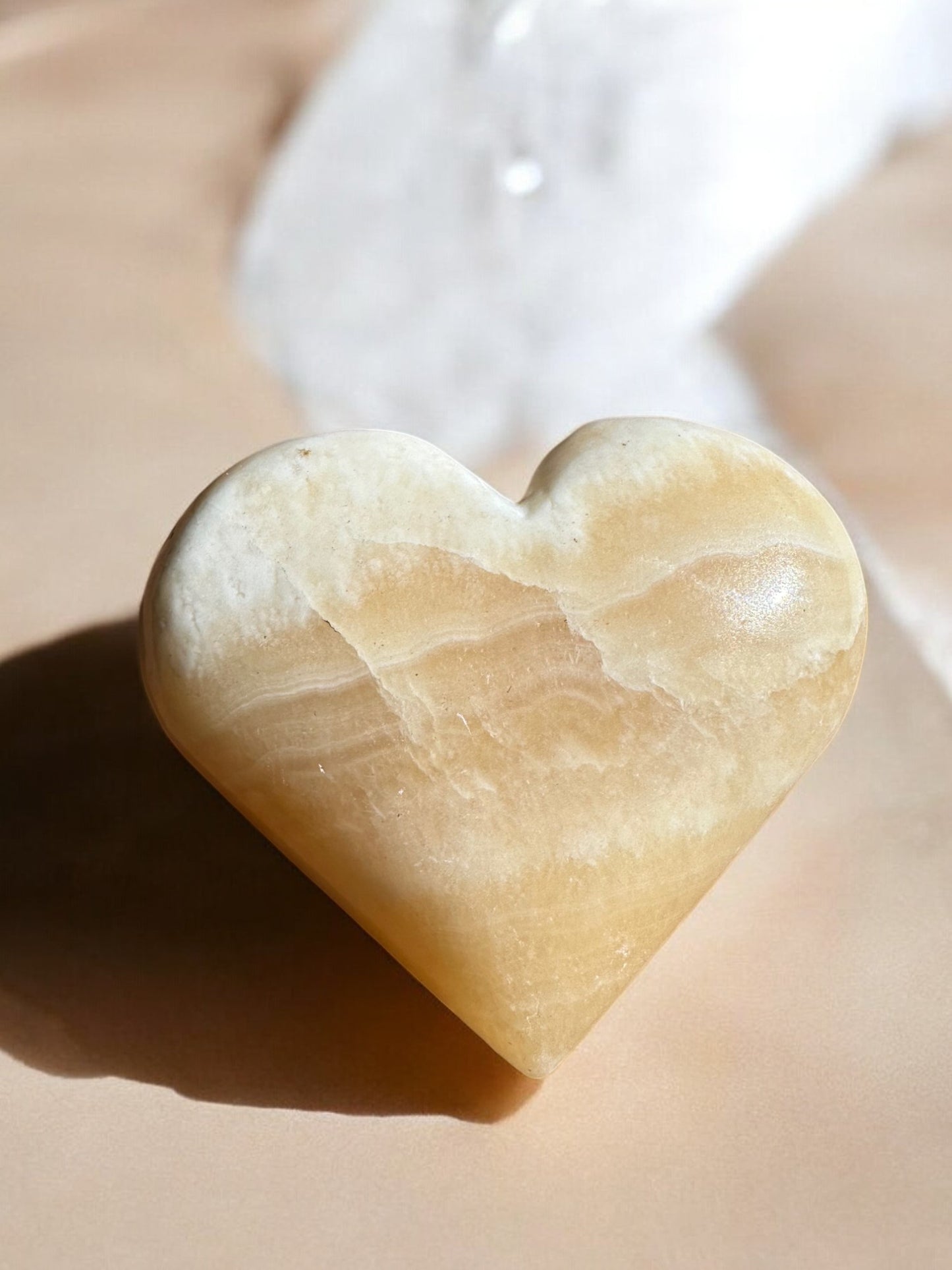 Orange calcite crystal heart