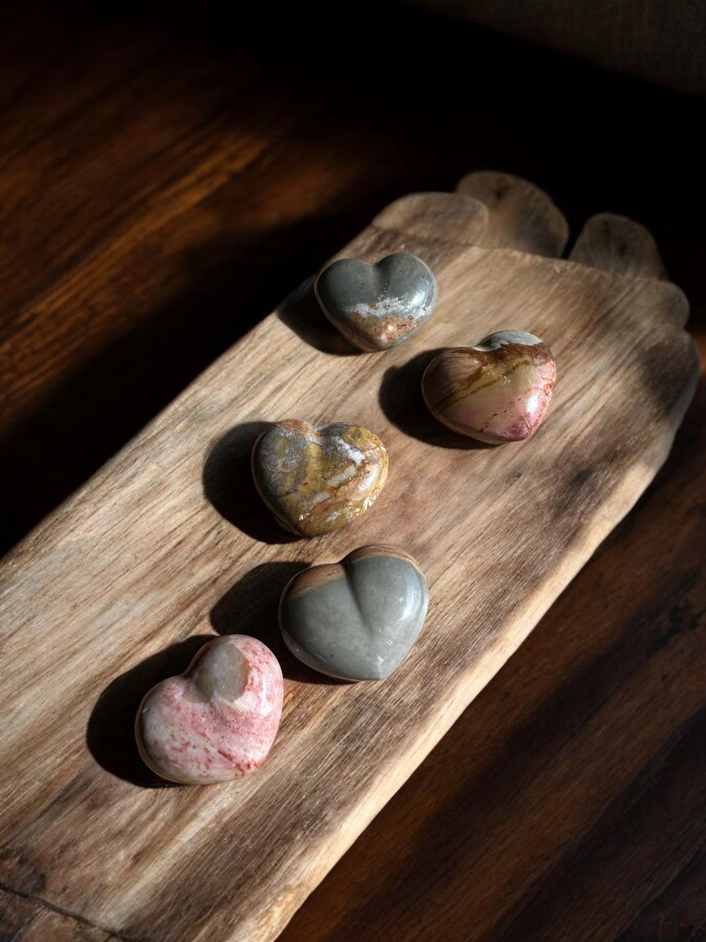 Polychrome crystal hearts on a slab