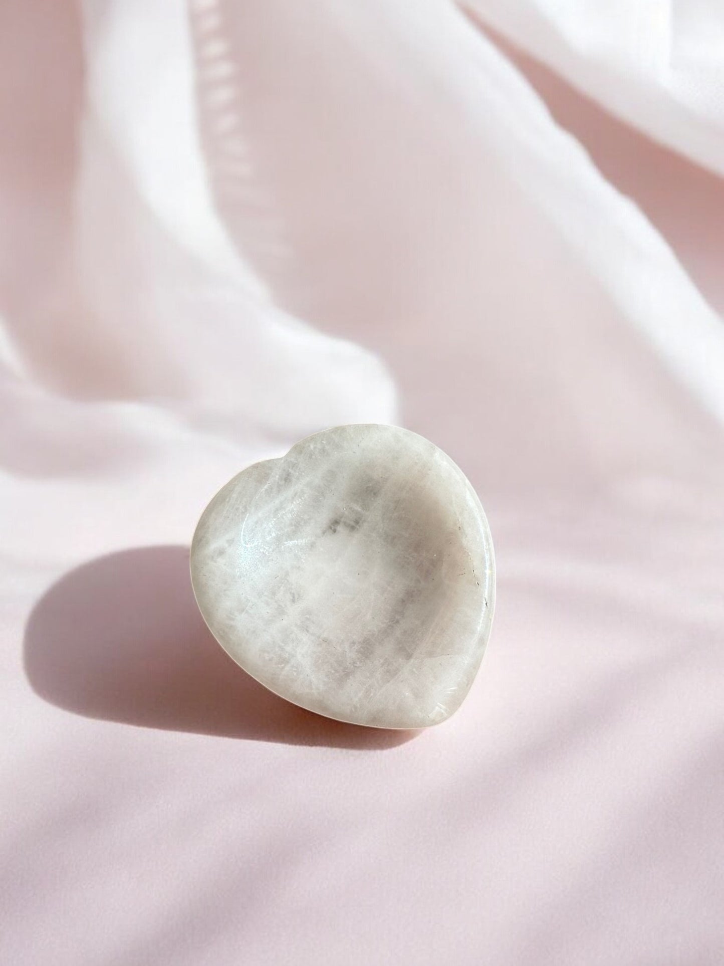 Rose quartz worry stone in heart shape