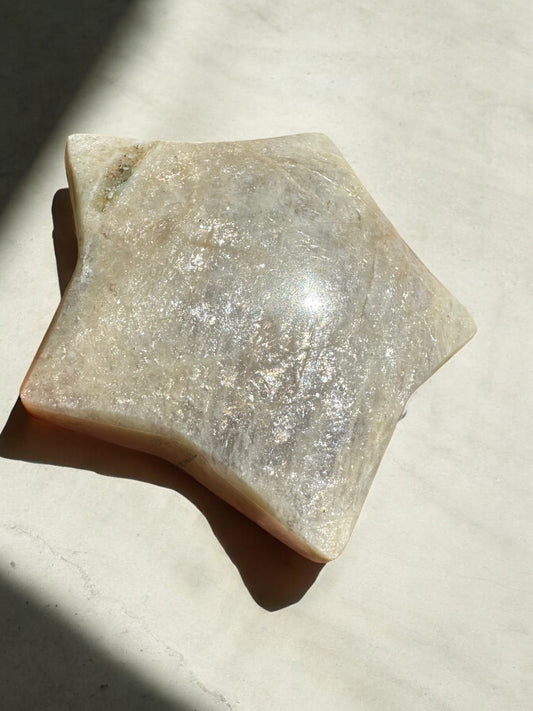 Sun stone in moonstone crystal star with sun flash