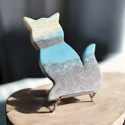 trolleite cat crystal slab on a stand